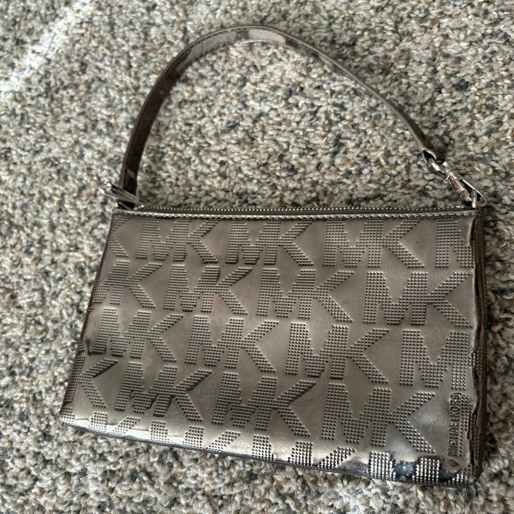 The City Lights Metallic Wristlet by Michael Kors