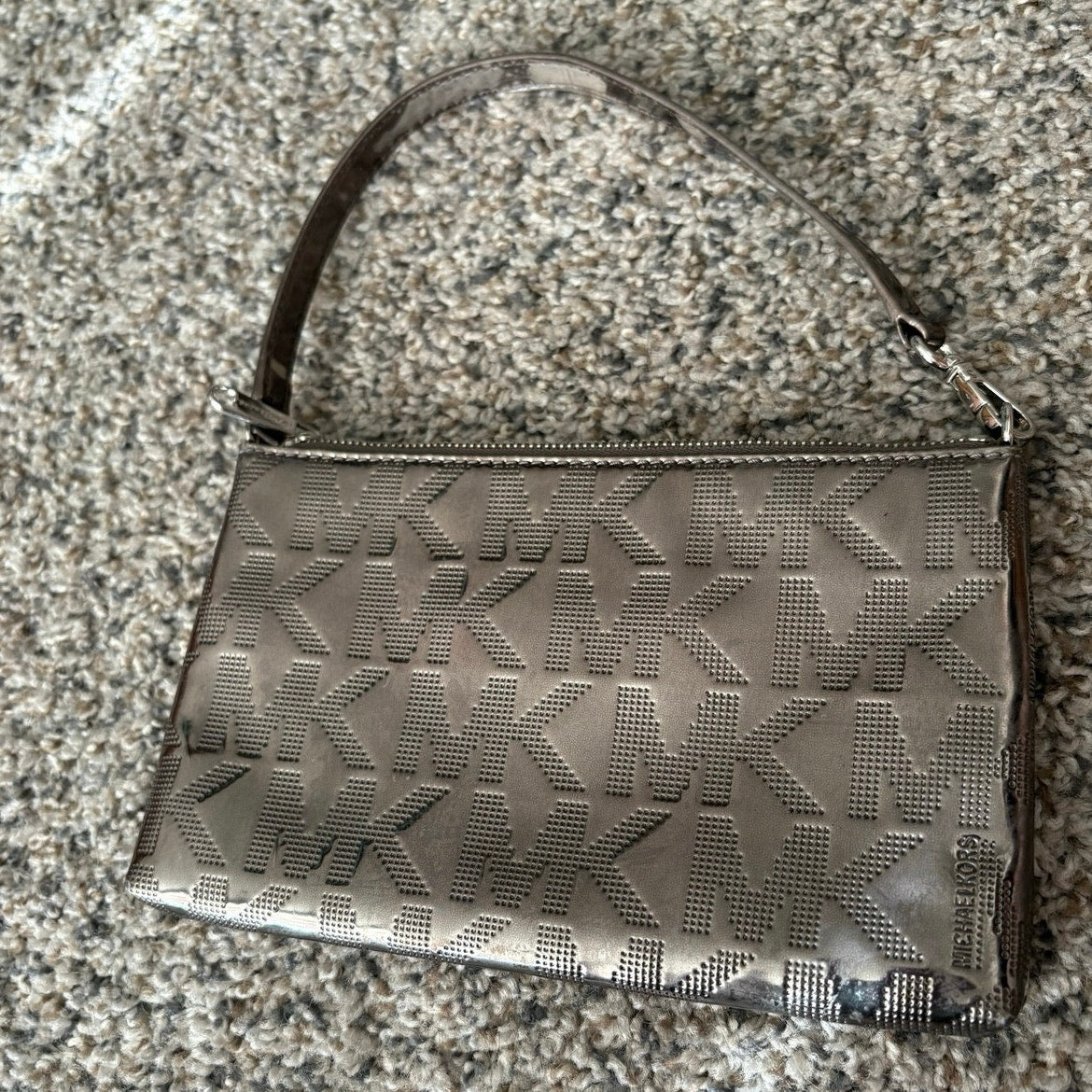 The City Lights Metallic Wristlet by Michael Kors