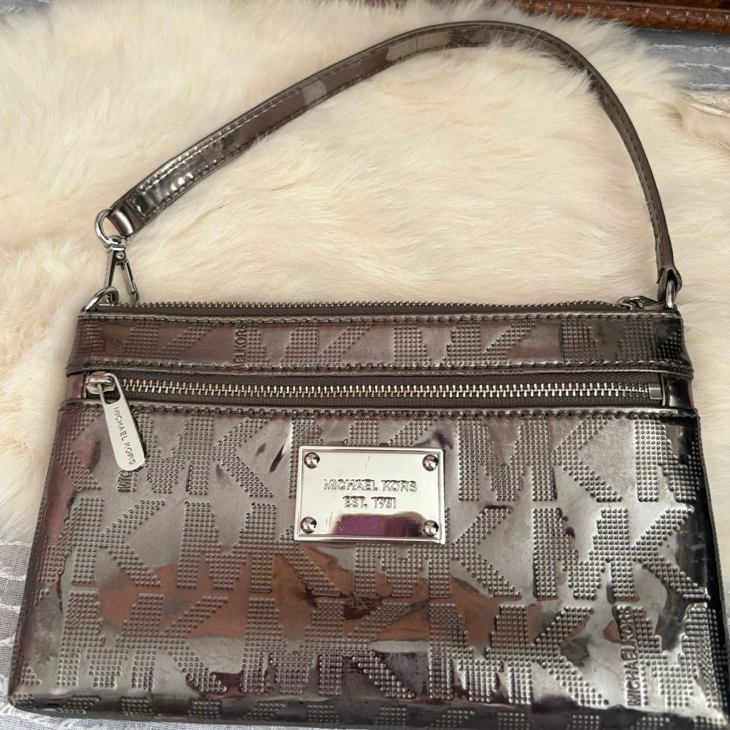 The City Lights Metallic Wristlet by Michael Kors