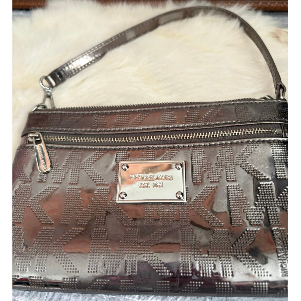 The City Lights Metallic Wristlet by Michael Kors