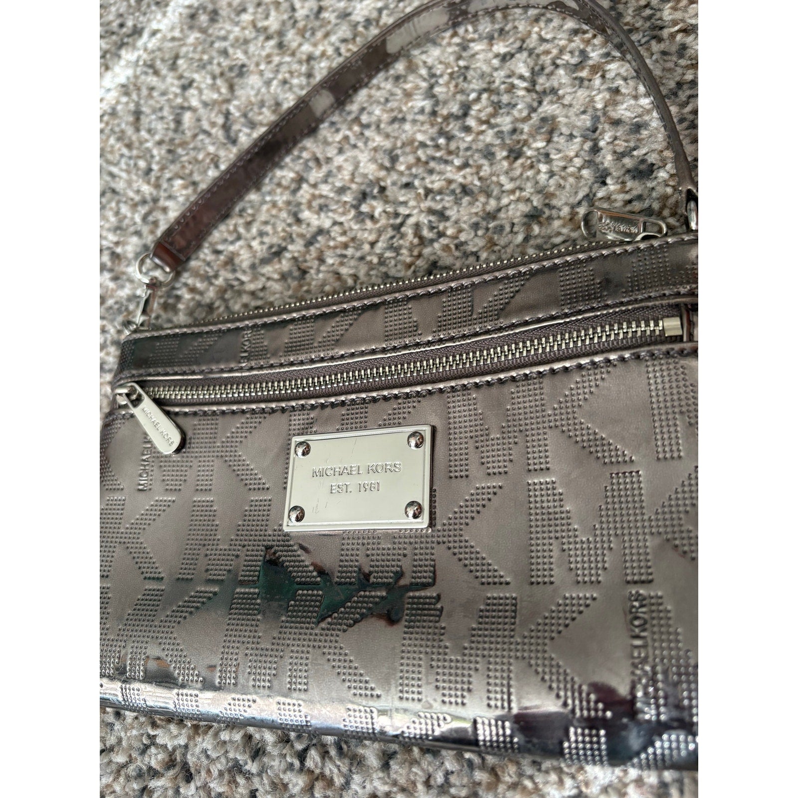 The City Lights Metallic Wristlet by Michael Kors