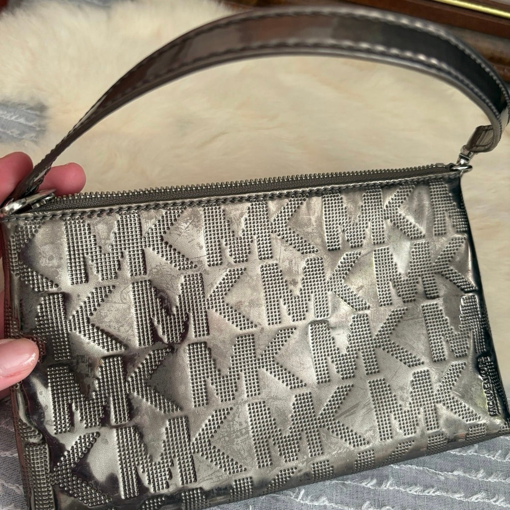 The City Lights Metallic Wristlet by Michael Kors