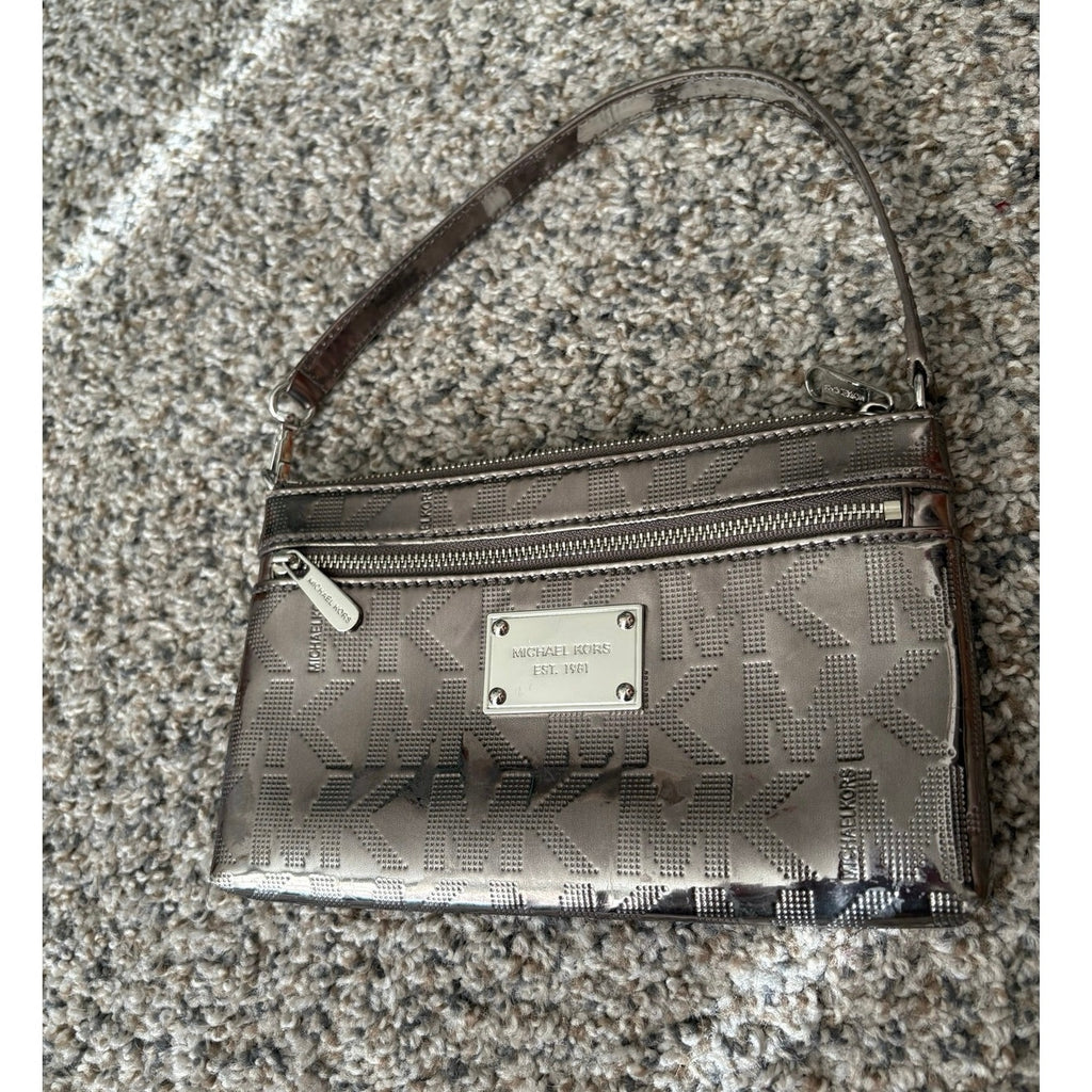 The City Lights Metallic Wristlet by Michael Kors