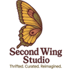 Butterfly illustration logo for a thrift boutique with text noting: "Second Wing Studio" "Thrifted. Curated. Reimagined."